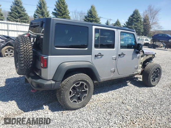 2015 Jeep Wrangler Unlimited Rubicon Hard Rock with VIN 1C4HJWFG2FL686556, listed as a Copart auction lot 54049955 with 126,675 mi miles and Salvage title. Bid and sale history available at DreamBid. Image 3.
