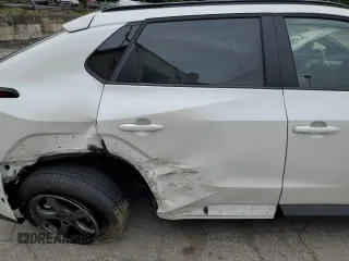 2024 Toyota bZ4X XLE with VIN JTMABACA2RA087660, listed as a Copart auction lot 61295995 with 2,288 mi miles and Salvage title. Bid and sale history available at DreamBid. Image 11.