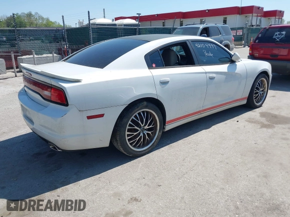 2014 Dodge Charger SE with VIN 2C3CDXBG2EH258886, listed as a IAAI auction lot 42104999 with 185,723 mi miles. Bid and sale history available at carsss.com. Image 4.