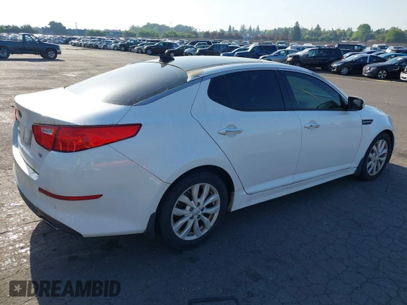 2014 Kia Optima EX with VIN 5XXGN4A73EG314797, listed as a IAAI auction lot 42136952 with 71,310 mi miles and . Bid and sale history available at carsss.com. Image 4.