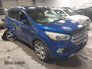 2018 Ford Escape Titanium with VIN 1FMCU9J99JUB94925, listed as a IAAI auction lot 42412800 with 95,880 mi miles and . Bid and sale history available at DreamBid. Image 1.