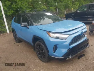 2022 Toyota RAV4 Hybrid XSE with VIN JTME6RFV7ND527447, listed as a IAAI auction lot 42358584 with 50,394 mi miles and . Bid and sale history available at DreamBid. Image 1.