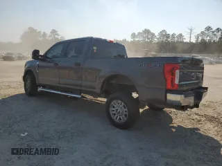 2017 Ford Super Duty F-250 SRW Lariat with VIN 1FT7W2B63HEC64659, listed as a Copart auction lot 46911295 with 147,237 mi miles and Salvage Title. Bid and sale history available at carsss.com. Image 2.