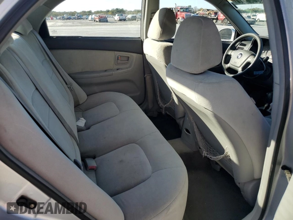 2006 Kia Spectra EX with VIN KNAFE121965372856, listed as a Copart auction lot 77365514 with 316,947 mi miles and Clean Title. Bid and sale history available at carsss.com. Image 10.