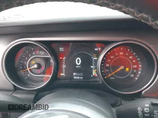 2020 Jeep Wrangler Unlimited Sahara with VIN 1C4HJXENXLW231194, listed as a IAAI auction lot 42083147 with 34,166 mi miles. Bid and sale history available at carsss.com. Image 7.