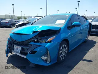 2021 Toyota Prius LE with VIN JTDKAMFP7M3169633, listed as a IAAI auction lot 41986170 with 55,925 mi miles and . Bid and sale history available at DreamBid. Image 19.