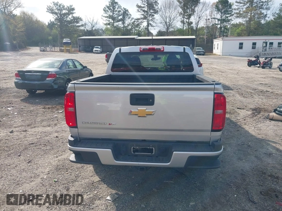 2019 Chevrolet Colorado 2WD Work Truck with VIN 1GCGSBEN3K1164686, listed as a IAAI auction lot 41943796 with 65,000 mi miles and . Bid and sale history available at DreamBid. Image 16.