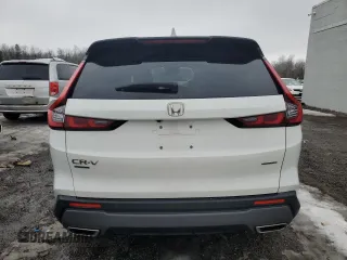2023 Honda CR-V Sport Touring with VIN 2HKRS6H99PH206129, listed as a Copart auction lot 46715315 with 32,775 mi miles and Salvage Title. Bid and sale history available at DreamBid. Image 6.