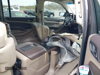 2019 Chevrolet Suburban LT with VIN 1GNSKHKC4KR405843, listed as a IAAI auction lot 41944385 with 123,071 mi miles and . Bid and sale history available at DreamBid. Image 8.