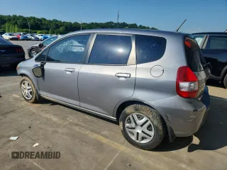 2007 Honda Fit with VIN JHMGD38407S066833, listed as a Copart auction lot 61713125 with 62,917 mi miles and Salvage title. Bid and sale history available at DreamBid. Image 2.