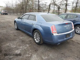 2011 Chrysler 300 with VIN 2C3CA6CT5BH575023, listed as a IAAI auction lot 42090856 with 200,309 mi miles. Bid and sale history available at carsss.com. Image 3.