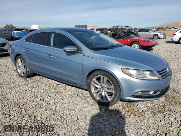 2013 Volkswagen CC Lux with VIN WVWRP7AN5DE525411, listed as a Copart auction lot 77148844 with 117,652 mi miles and Salvage Title. Bid and sale history available at DreamBid. Image 4.