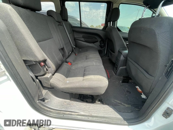 2018 Ford Transit Connect XLT z VIN NM0GE9F71J1375042, wystawiony jako Copart lot #64799455 z przebiegiem 212 159 mil mil oraz Czysty tytuł • Clean title. Historia ofert i sprzedaży dostępna na DreamBid. Obrazek 6.