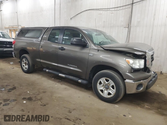 2009 Toyota Tundra z VIN 5TFBT54129X015491, wystawiony jako Copart lot #50884015 z przebiegiem 142 533 mil mil oraz Szkody całkowita. Historia ofert i sprzedaży dostępna na DreamBid. Obrazek 4.