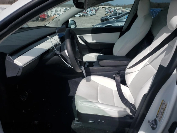 2022 Tesla Model Y Long Range z VIN 7SAYGDEE0NF339363, wystawiony jako Copart lot #44604015 z przebiegiem 48 002 mil mil oraz Szkody całkowita. Historia ofert i sprzedaży dostępna na DreamBid. Obrazek 7.