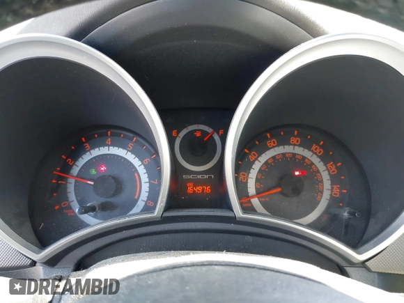 2014 Scion tC with VIN JTKJF5C78E3074094, listed as a IAAI auction lot 41828785 with 164,976 mi miles. Bid and sale history available at carsss.com. Image 7.