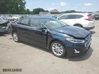 2020 Ford Fusion Plug-In Hybrid Titanium with VIN 3FA6P0SUXLR257974, listed as a Copart auction lot 59457044 with 35,006 mi miles and Salvage Title. Bid and sale history available at carsss.com. Image 4.