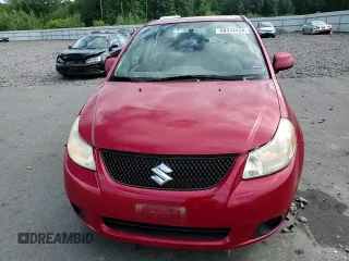 2012 Suzuki SX4 LE with VIN JS2YC5A34C6300079, listed as a Copart auction lot 68414434 with 111,661 mi miles and Salvage Title. Bid and sale history available at carsss.com. Image 10.