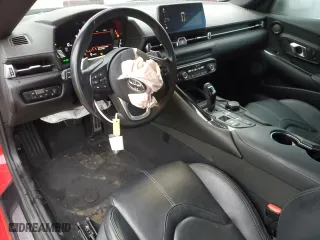 2023 Toyota GR Supra 3.0 with VIN WZ1DB0G08PW056651, listed as a Copart auction lot 85150754 with 31,194 mi miles and Salvage Title. Bid and sale history available at carsss.com. Image 8.