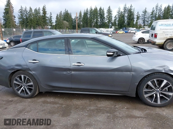 2023 Nissan Maxima SV with VIN 1N4AA6CV4PC512497, listed as a IAAI auction lot 41760990 with 32,400 mi miles and . Bid and sale history available at DreamBid. Image 13.