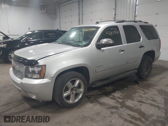 2012 Chevrolet Tahoe LT z VIN 1GNSCBE01CR326465, wystawiony jako IAAI lot #42183450 z przebiegiem 220 129 mil mil oraz . Historia ofert i sprzedaży dostępna na DreamBid. Obrazek 2.