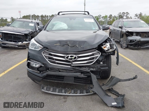 2018 Hyundai Santa Fe Ultimate with VIN 5XYZWDLA6JG570808, listed as a IAAI auction lot 41941878 with 47,391 mi miles and . Bid and sale history available at DreamBid. Image 12.