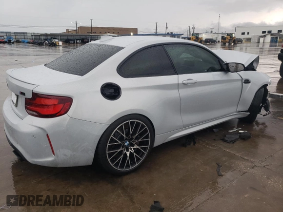 2020 BMW M2 Competition with VIN WBS2U7C01L7D66378, listed as a Copart auction lot 86432704 with 56,973 mi miles and Salvage Title. Bid and sale history available at carsss.com. Image 3.