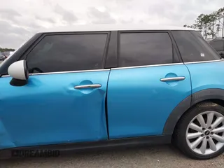 2017 MINI Hardtop 4 Door Cooper S z VIN WMWXU3C37H2F48944, wystawiony jako IAAI lot #41732140 z przebiegiem 154 563 mil mil oraz . Historia ofert i sprzedaży dostępna na DreamBid. Obrazek 14.