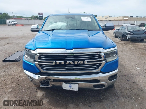 2021 Ram 1500 Laramie with VIN 1C6SRFJT1MN774879, listed as a IAAI auction lot 42242318 with 51,971 mi miles and . Bid and sale history available at DreamBid. Image 13.