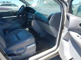 2001 Toyota Sienna LE z VIN 4T3ZF13C61U393209, wystawiony jako IAAI lot #42304583 z przebiegiem 253 662 mil mil oraz . Historia ofert i sprzedaży dostępna na DreamBid. Obrazek 5.