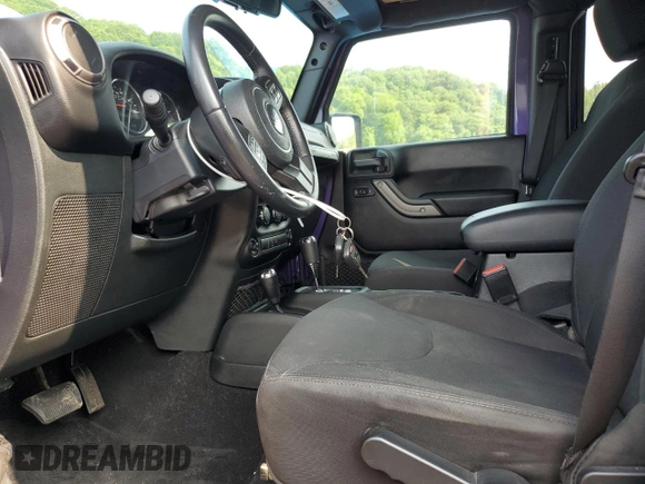 2018 Jeep Wrangler Unlimited Sport with VIN 1C4BJWDG9JL910410, listed as a Copart auction lot 60778405 with 57,450 mi miles and Salvage title. Bid and sale history available at DreamBid. Image 7.