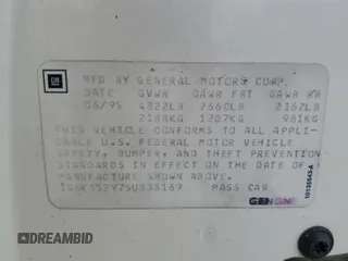 1995 Cadillac Seville Luxury SLS z VIN 1G6KS52Y7SU838169, wystawiony jako Copart lot #67941934 z przebiegiem 144 953 mil mil oraz Szkoda całkowita • Salvage title. Historia ofert i sprzedaży dostępna na DreamBid. Obrazek 12.
