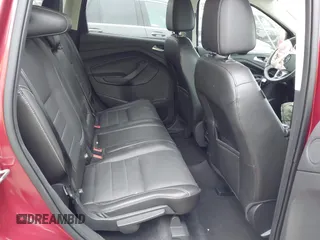 2015 Ford Escape Titanium with VIN 1FMCU0J98FUC07196, listed as a IAAI auction lot 41930660 with 51,161 mi miles and . Bid and sale history available at DreamBid. Image 8.