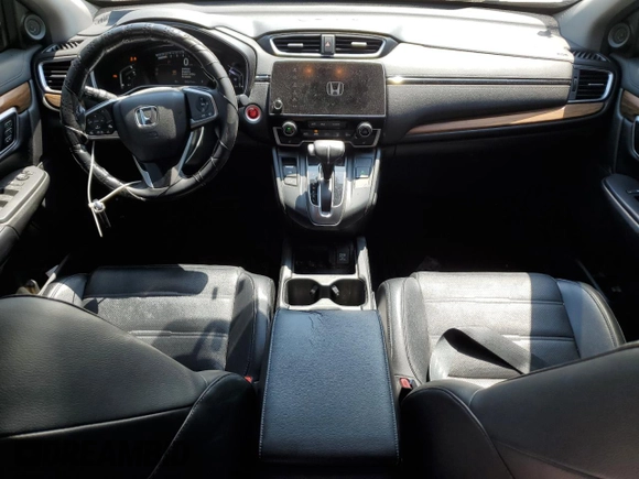 2018 Honda CR-V Touring with VIN 7FARW1H9XJE001467, listed as a Copart auction lot 55222005 with 65,611 mi miles and Salvage title. Bid and sale history available at DreamBid. Image 8.