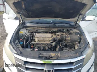 2010 Honda Crosstour EX-L z VIN 5J6TF1H51AL001055, wystawiony jako IAAI lot #42272313 z przebiegiem 228 485 mil mil oraz . Historia ofert i sprzedaży dostępna na DreamBid. Obrazek 10.