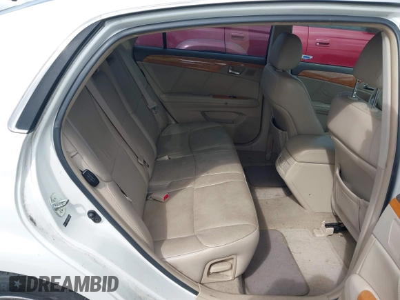 2005 Toyota Avalon XL z VIN 4T1BK36B35U023068, wystawiony jako IAAI lot #41920638 z przebiegiem 196 001 mil mil oraz . Historia ofert i sprzedaży dostępna na DreamBid. Obrazek 8.