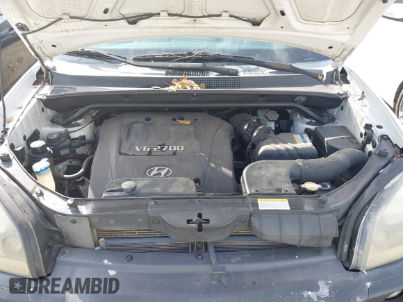 2007 Hyundai Tucson SE with VIN KM8JN12D77U638627, listed as a IAAI auction lot 41551224 with 156,125 mi miles. Bid and sale history available at carsss.com. Image 10.