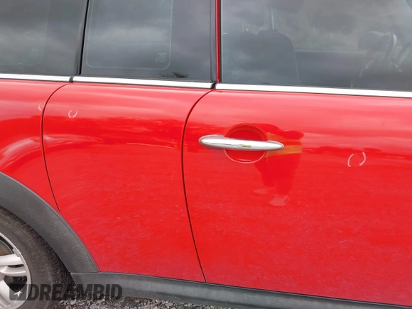 2013 MINI Clubman z VIN WMWZF3C50DT490262, wystawiony jako IAAI lot #41674033 z przebiegiem 194 622 mil mil oraz . Historia ofert i sprzedaży dostępna na DreamBid. Obrazek 6.