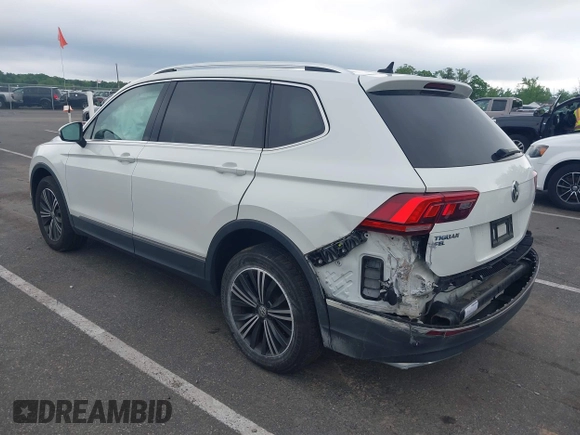 2018 Volkswagen Tiguan SEL with VIN 3VV2B7AX4JM012840, listed as a IAAI auction lot 42263511 with 105,510 mi miles and . Bid and sale history available at DreamBid. Image 3.