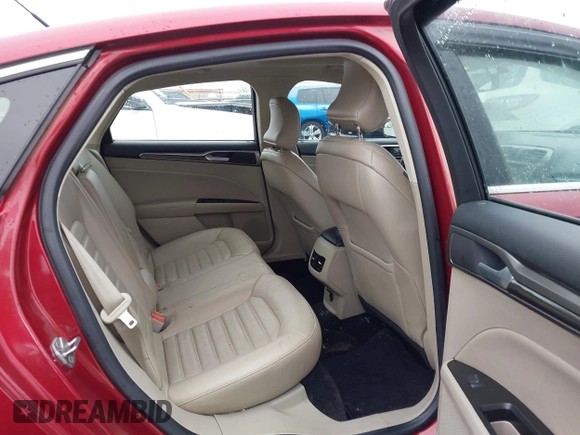2017 Ford Fusion SE z VIN 3FA6P0H98HR175087, wystawiony jako IAAI lot #41557481 z przebiegiem 103 752 mil mil oraz . Historia ofert i sprzedaży dostępna na DreamBid. Obrazek 8.