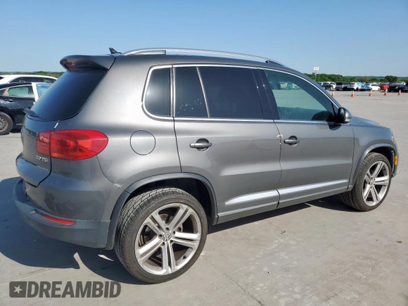 2014 Volkswagen Tiguan SEL z VIN WVGAV3AX6EW030705, wystawiony jako Copart lot #52156805 z przebiegiem 142 377 mil mil oraz Szkoda całkowita • Salvage title. Historia ofert i sprzedaży dostępna na DreamBid. Obrazek 3.