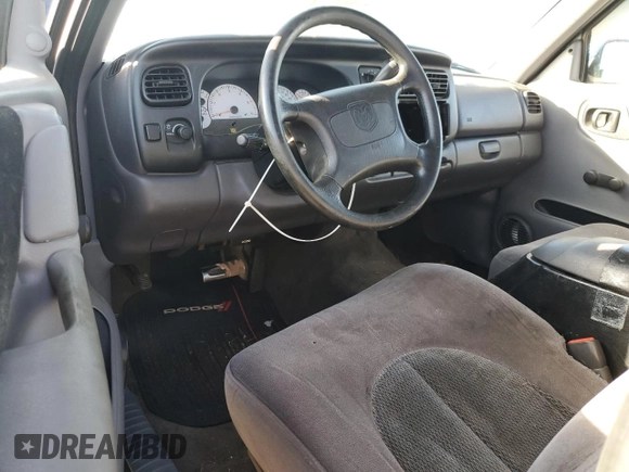 1998 Dodge Dakota SLT z VIN 1B7FL26XXWS656706, wystawiony jako Copart lot #75295904 z przebiegiem 89 796 mil mil oraz Szkoda całkowita • Salvage title. Historia ofert i sprzedaży dostępna na DreamBid. Obrazek 8.