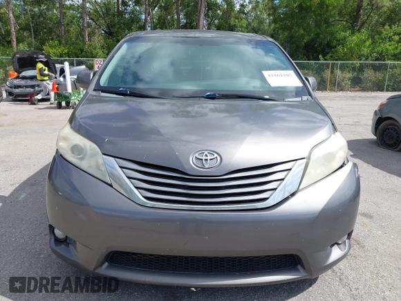 2015 Toyota Sienna XLE with VIN 5TDYK3DC3FS556859, listed as a IAAI auction lot 42161107 with 200,502 mi miles and . Bid and sale history available at DreamBid. Image 12.