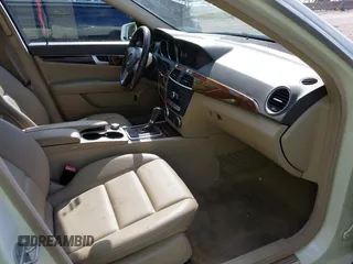 2012 Mercedes-Benz C with VIN WDDGF8BB9CR230328, listed as a IAAI auction lot 42024792 with 129,739 mi miles. Bid and sale history available at carsss.com. Image 5.