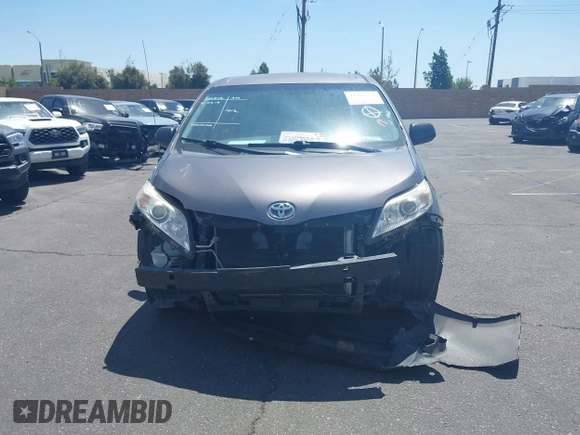 2012 Toyota Sienna with VIN 5TDZK3DC9CS261944, listed as a IAAI auction lot 41885359 with 184,918 mi miles. Bid and sale history available at carsss.com. Image 13.