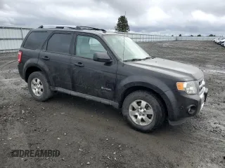 2011 Ford Escape Hybrid with VIN 1FMCU5K35CKA44084, listed as a Copart auction lot 49094385 with 120,066 mi miles and Salvage title. Bid and sale history available at DreamBid. Image 4.