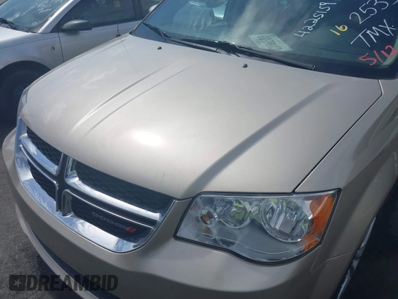 2014 Dodge Grand Caravan SXT z VIN 2C4RDGCG6ER162533, wystawiony jako IAAI lot #42251591 z przebiegiem 70 666 mil mil oraz . Historia ofert i sprzedaży dostępna na DreamBid. Obrazek 6.