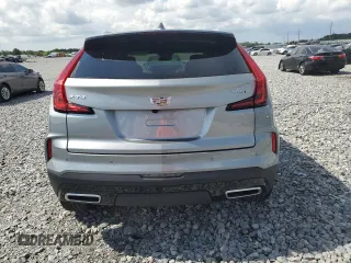 2025 Cadillac XT4 FWD Premium Luxury z VIN 1GYFZCR43SF128251, wystawiony jako Copart lot #59265035 z przebiegiem 7 271 mil mil oraz Czysty tytuł • Clean title. Historia ofert i sprzedaży dostępna na DreamBid. Obrazek 6.