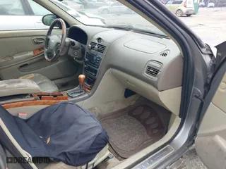 2004 Infiniti I35 with VIN JNKDA31AX4T212950, listed as a IAAI auction lot 41390493 with 123,198 mi miles. Bid and sale history available at carsss.com. Image 5.