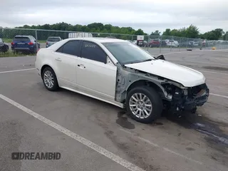 2010 Cadillac CTS Luxury with VIN 1G6DG5EG2A0140328, listed as a IAAI auction lot 42512415 with 198,344 mi miles and . Bid and sale history available at DreamBid. Image 1.